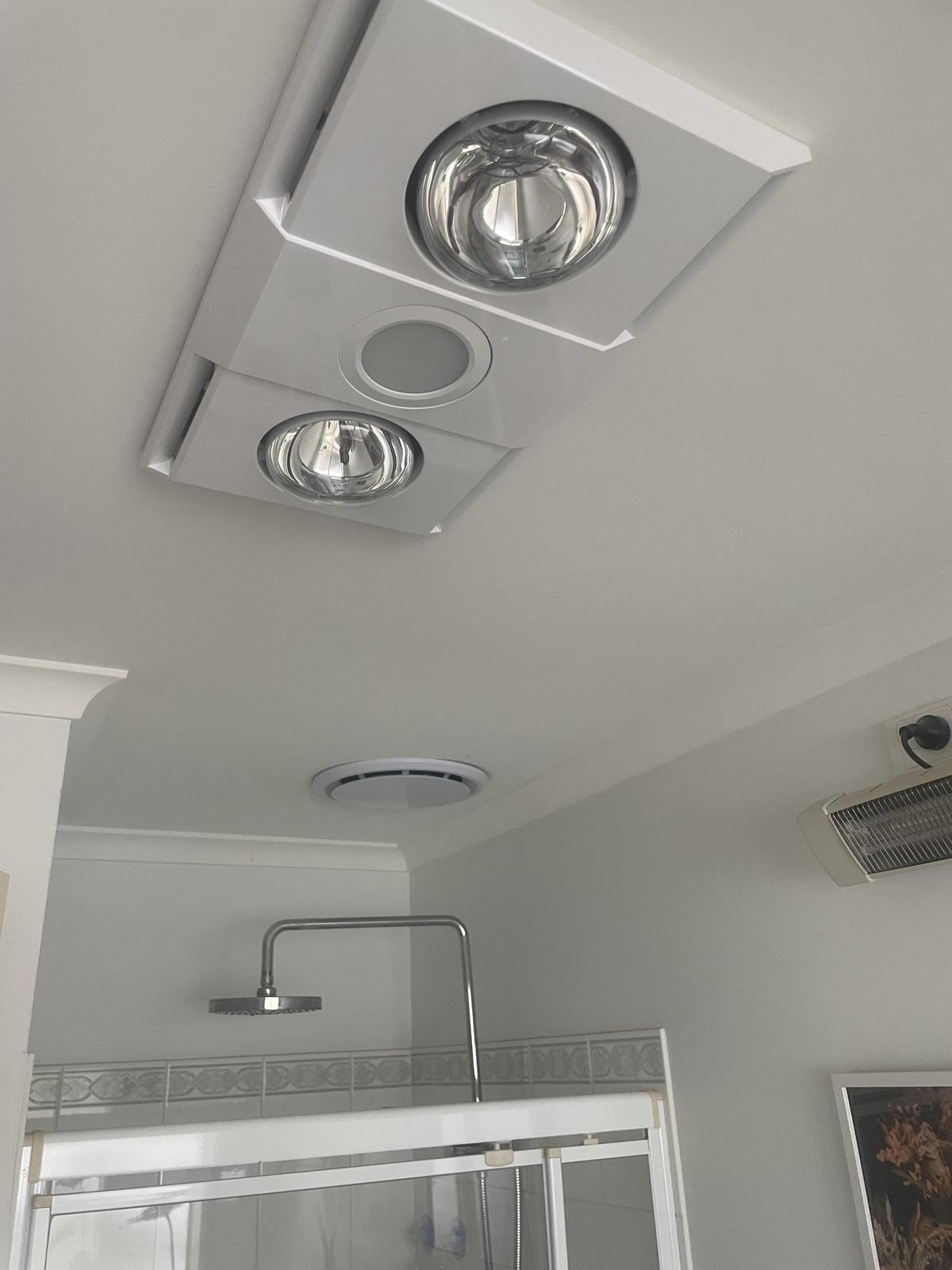 Bathroom heat lamp and exhaust fan installation